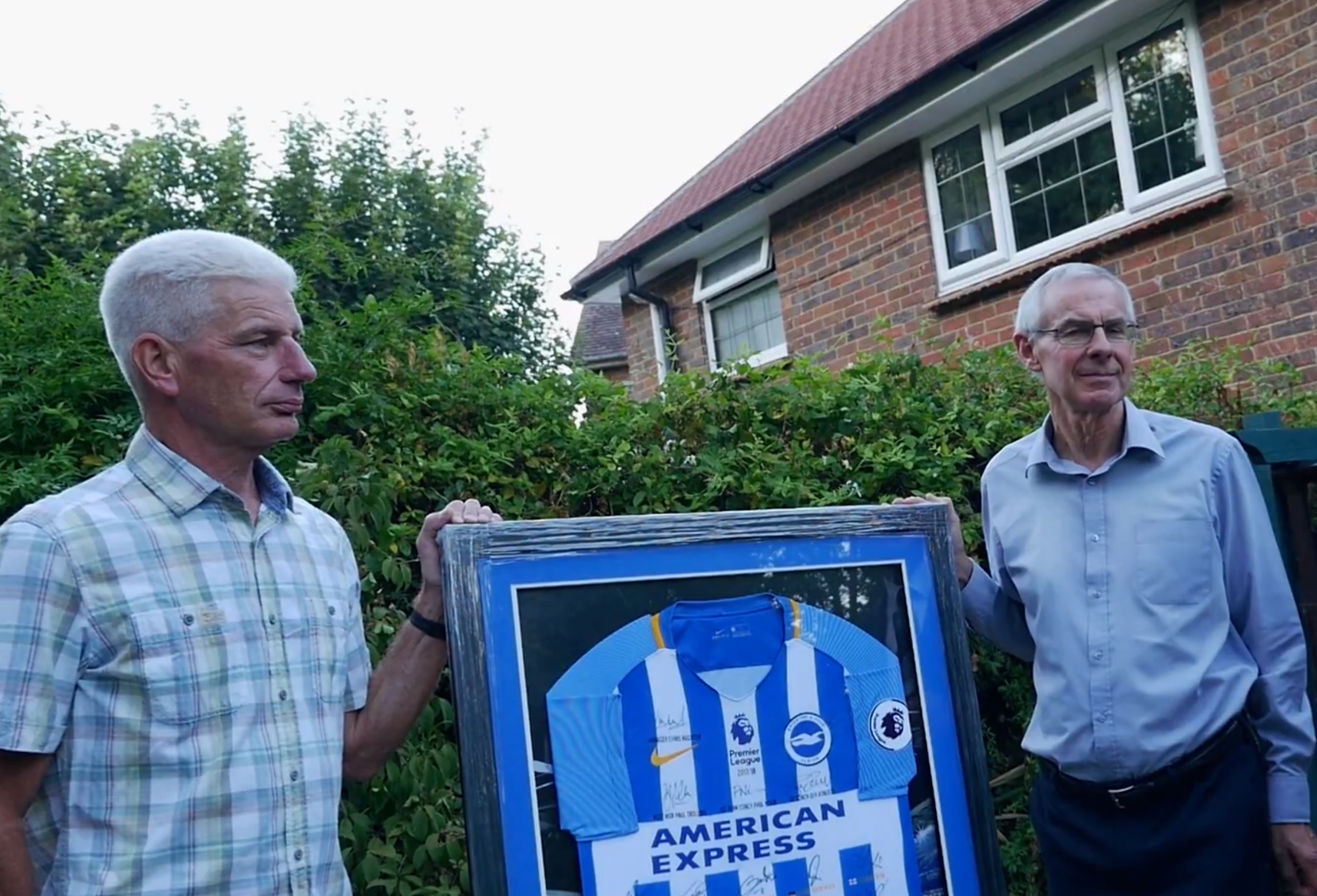 Shoreham Airshow disaster parents Bob Schilt and Matt Grimstone auction signed Albion shirt for charity