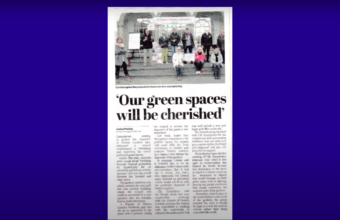 A newspaper article titled 'Our Green Spaces Will be Cherished'