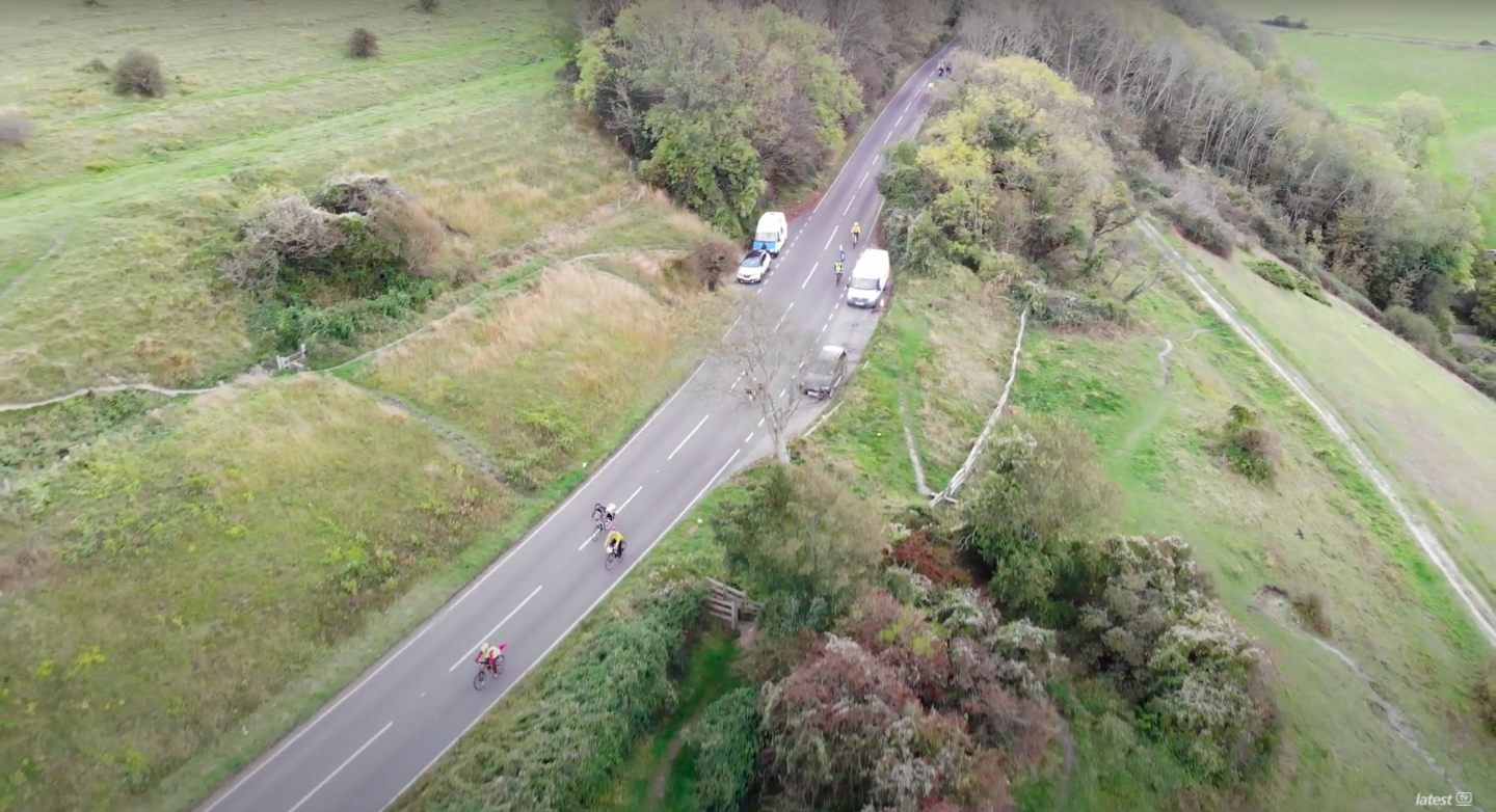 A drone photograph of cyclists riding from brighton to glasgow to visit the COP26 conference